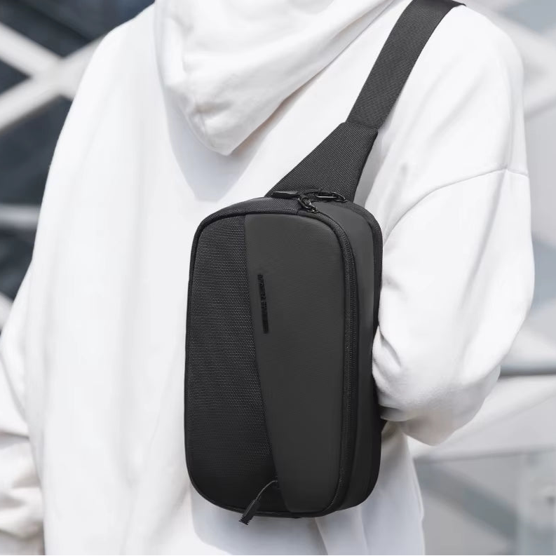 Sacoche noire bandoulière homme étanche multi-poches
